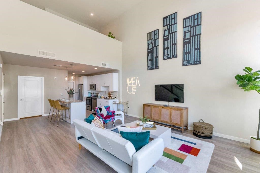 a living room with a couch and a tv