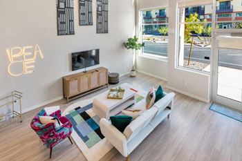 a living room with a couch and a tv