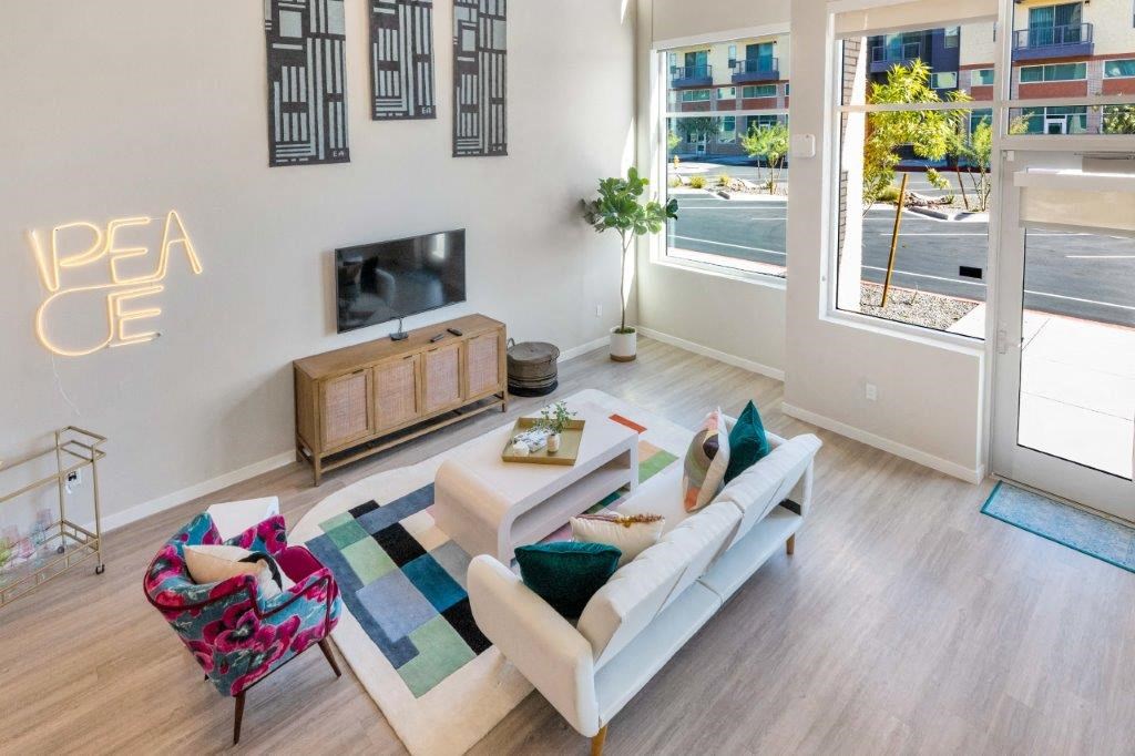 a living room with a couch and a tv