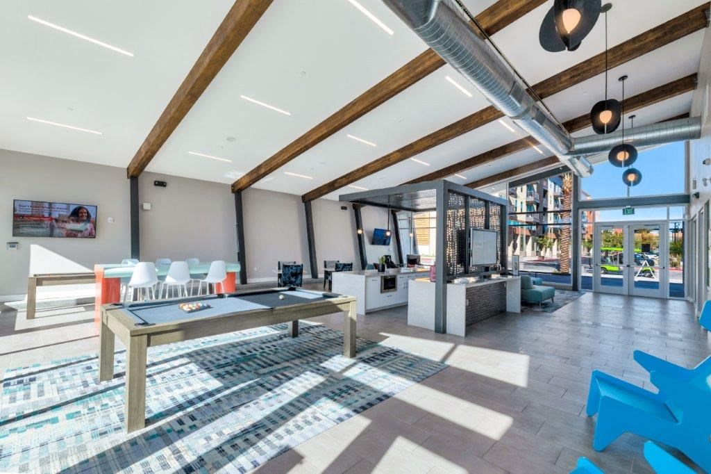 a clubhouse with a ping pong table in the middle