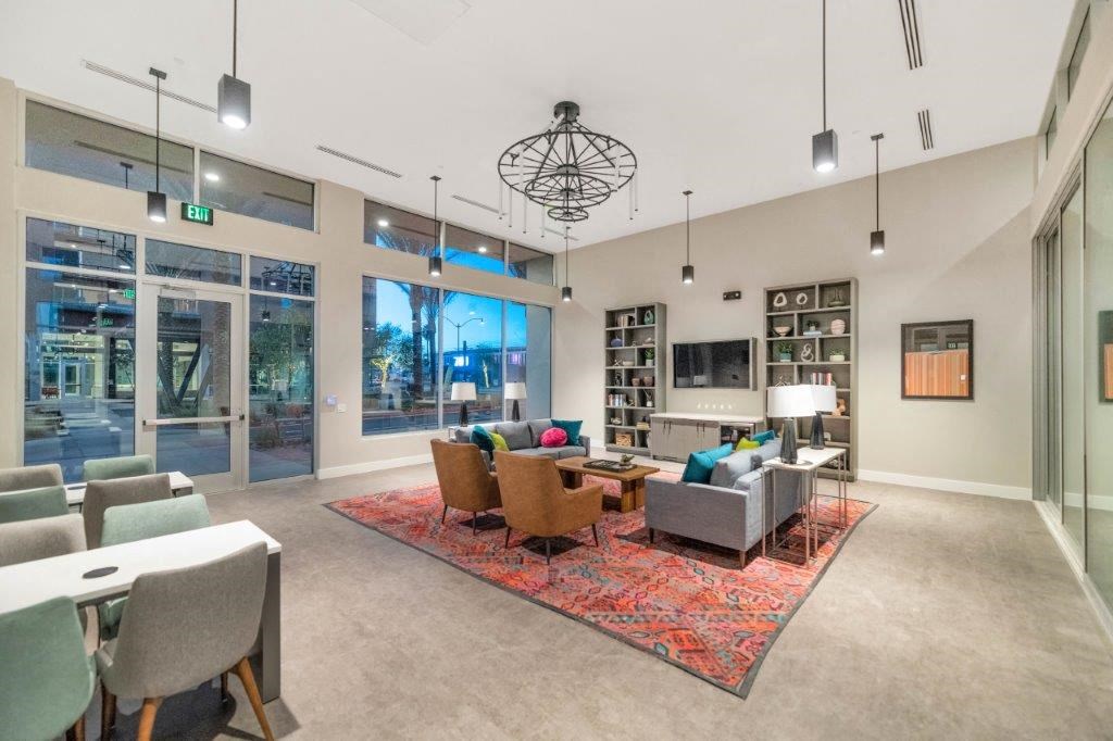 a living room with a couch and a table