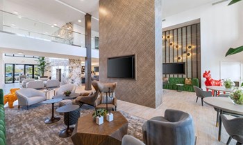 Large Clubhouse With Ample Sitting And Television Large Clubhouse With Ample Sitting And Television at Kalon Luxury Apartments, Phoenix, Arizona - Photo Gallery 4