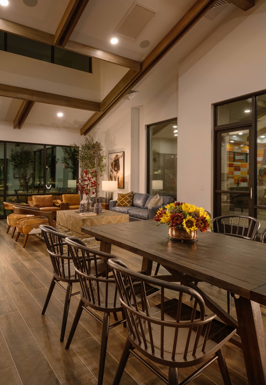 a dining room with a wooden table and chairs at Weylyn Luxury Apartments, Arizona