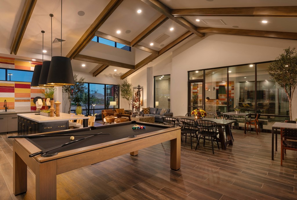 a game room with a pool table and a dining area at Weylyn Luxury Apartments, Laveen, Arizona