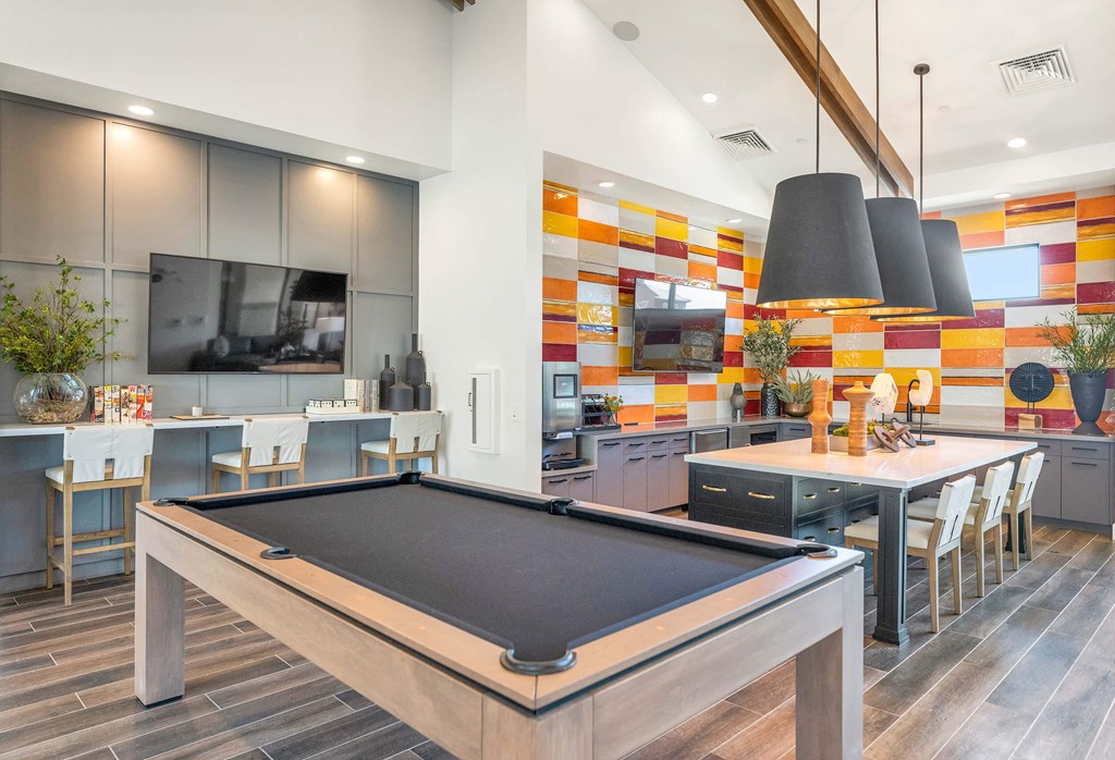 a blurry picture of a room with tables and chairsat Weylyn Luxury Apartments, Laveen, AZ