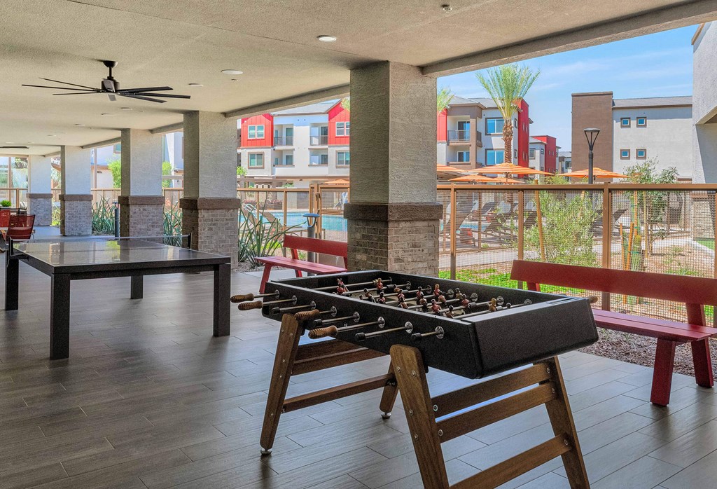 a foosball table in the lobby of a building at Weylyn Luxury Apartments, Arizona