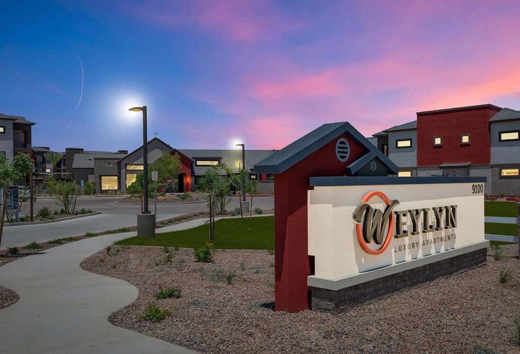 a building with a sign that reads cyber valley at sunsetat Weylyn Luxury Apartments, Laveen, AZ 85339