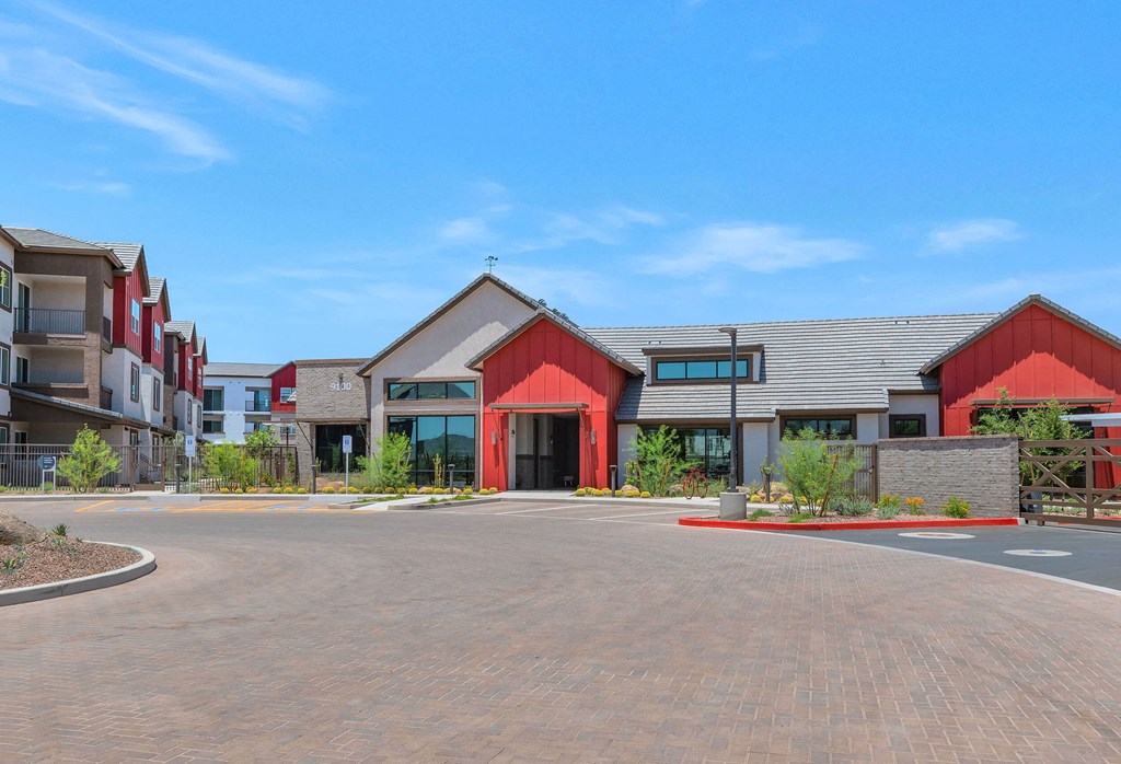 an empty parking lot in front of an apartment buildingat Weylyn Luxury Apartments, Laveen, AZ