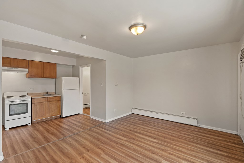a kitchen and living room in a 555 waverly unit