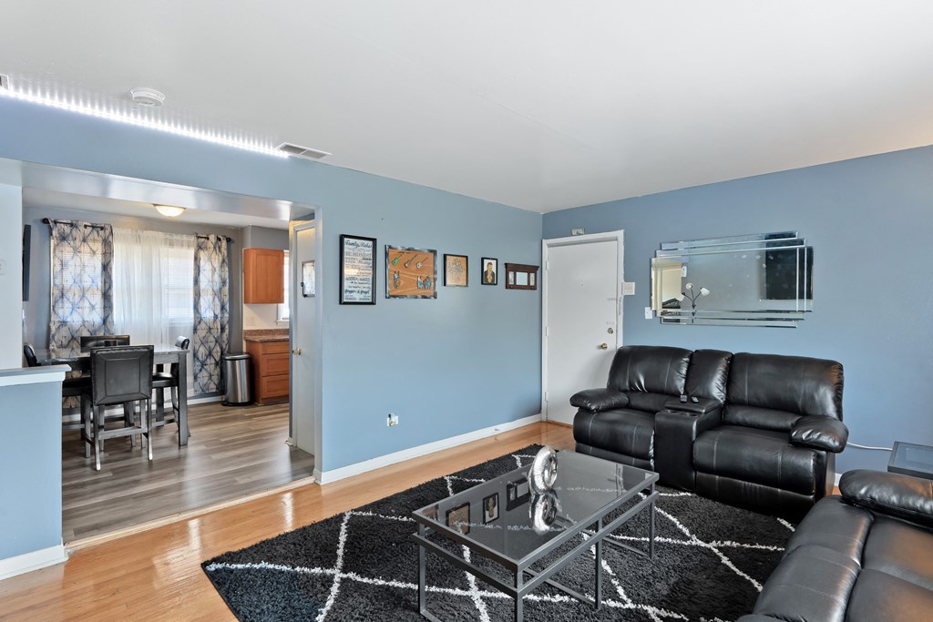 a living room with two couches and a coffee table