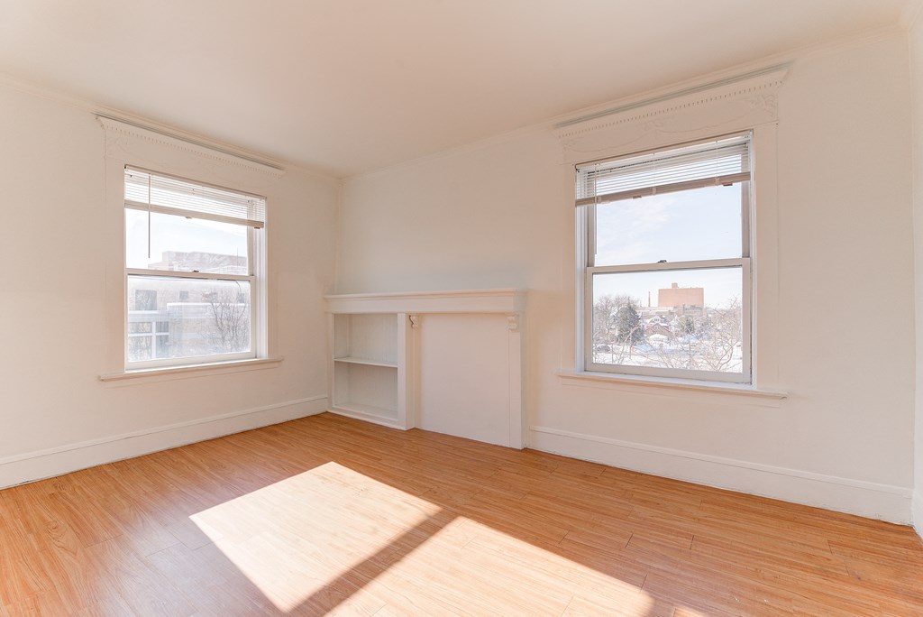 Beige Carpet In Bedroom at Johnson Legacy Apartments, Milwaukee, WI, 53223
