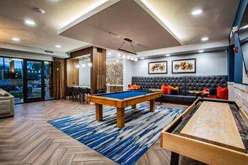 Game Room Complete with Billiards, Shuffleboard and Wall Scrabble at North Phoenix Apartment