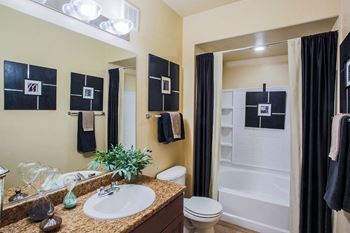 Bathroom with Granite Counters at North LV Apartment Rentals