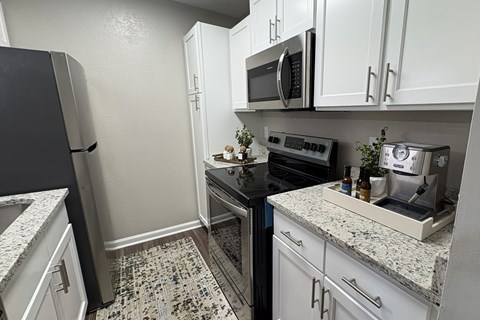 Kitchen with Stainless Steel Appliances at Best Apartments in Gwinnett County