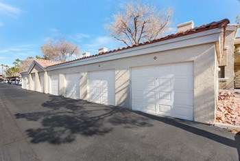 Resident Garages with White Doors at Vintage at the Lakes Apartments in Vegas - Photo Gallery 18