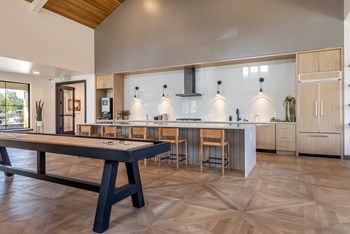 Large Clubhouse with Shuffleboard at New Apartments Ridgefield WA - Photo Gallery 12