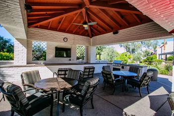Firepit with Seating at Casas Adobes, AZ Apartments
