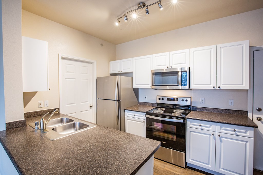 Downtown Thornton CO Apartments with Full Kitchen with Microwave and Dishwasher