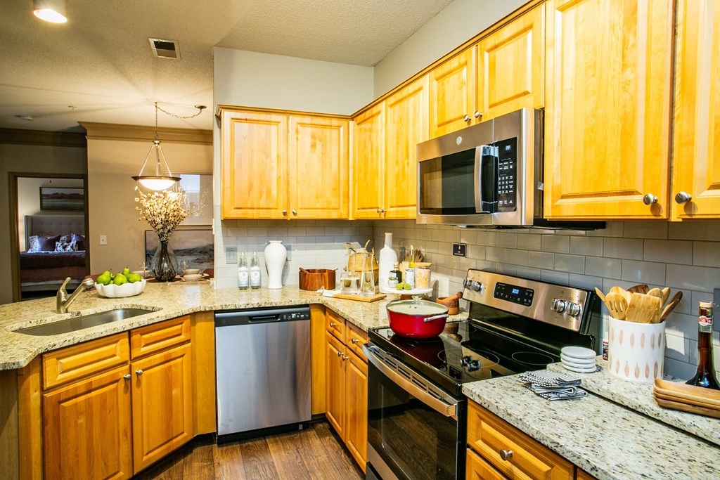 Full Kitchen with Granite Countertops at Spacious Apartments Near North Druid Hills, GA