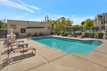 Lounge Chairs Outside on Ladera Vista Apartments Pool Deck - Photo Gallery 2