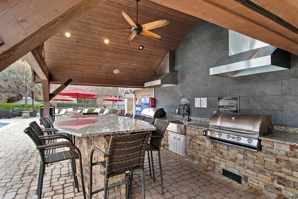 Outdoor Kitchen and BBQ Area at Apartments on Satellite Blvd