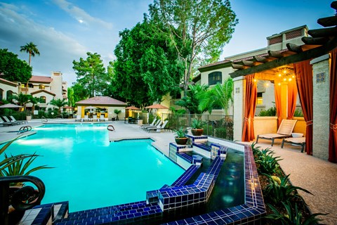 Beautiful Swimming Pool with Outdoor Seating at 1, 2, and 3 Bedroom Apartments Scottsdale AZ