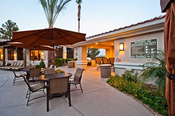 Poolside Lounge Area with Extensive Landscaping - Photo Gallery 4