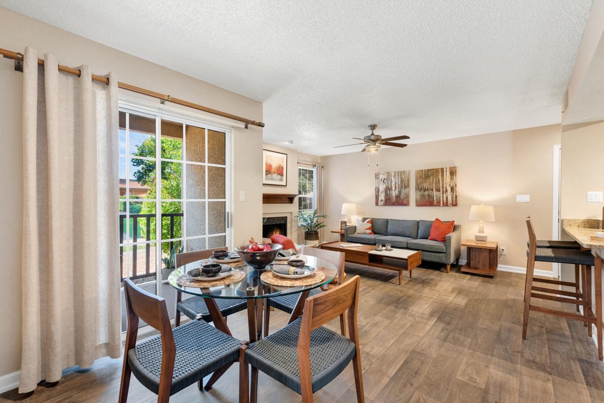 Spacious Apartment Dining Room with Faux Wood Flooring