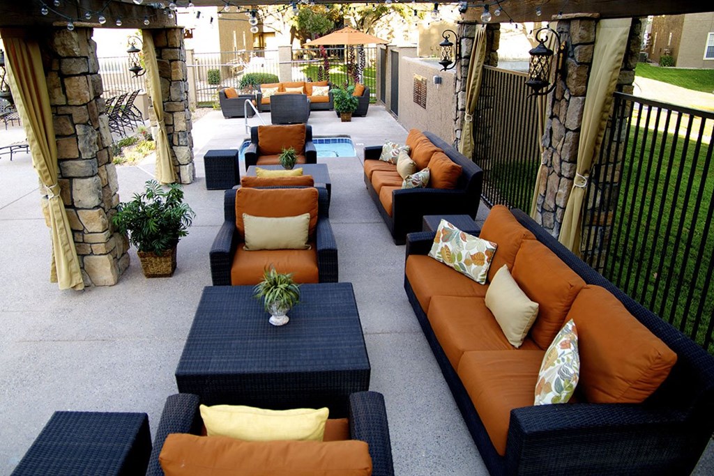 Outdoor Chairs on Poolside Sundeck at River Walk Apartments