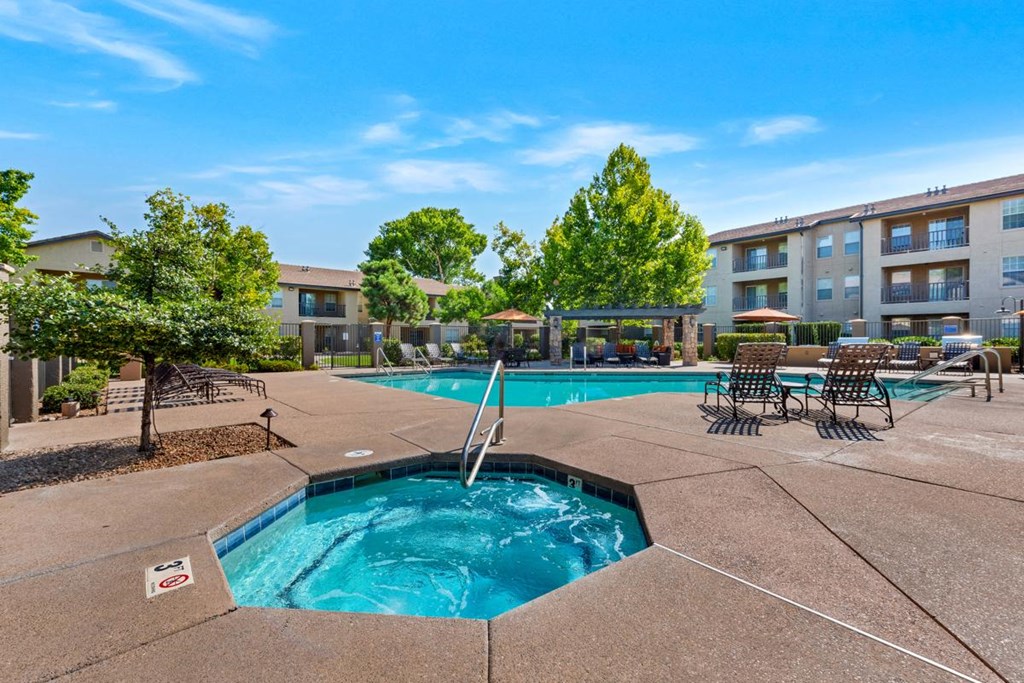 River Walk at Puerta de Corrales Apartments in Albuquerque, NM Resort Style Swimming Pool and Spa at River Walk at Puerta de Corrales Apartments in Albuquerque, NM
