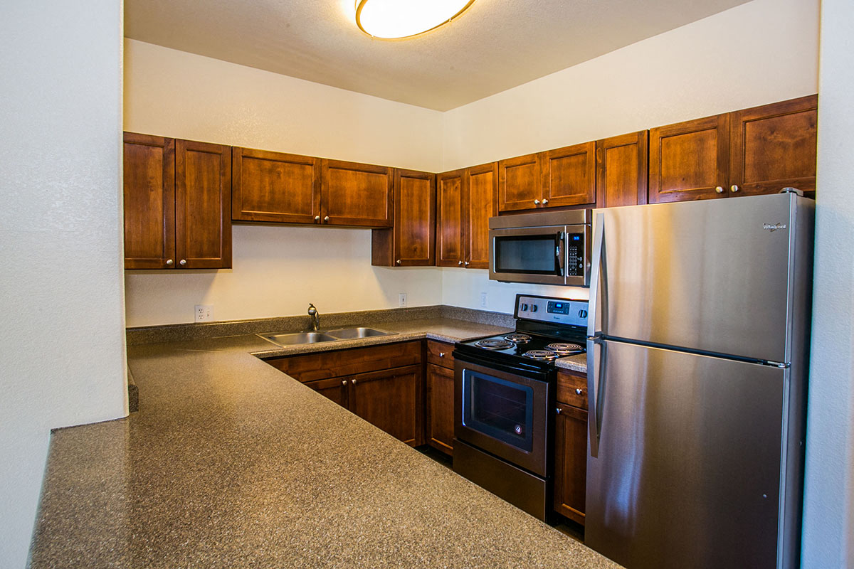 Full Upgraded Kitchen with Stainless Steel Appliances and Granite Countertops at Apartments in Deer Valley AZ