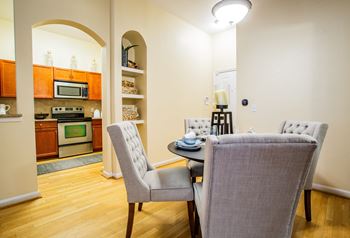 Dining Room Area with Arched Entryway at Phoenix Apartment Near Highway 51