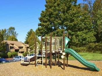 Outdoor Children's Playground at Maple Valley Apartment