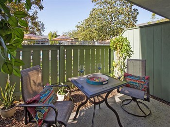 Picturesque Patio And Garden Setting Picturesque Patio And Garden Setting, at Pacific Oaks Apartments, Towbes, Goleta - Photo Gallery 4