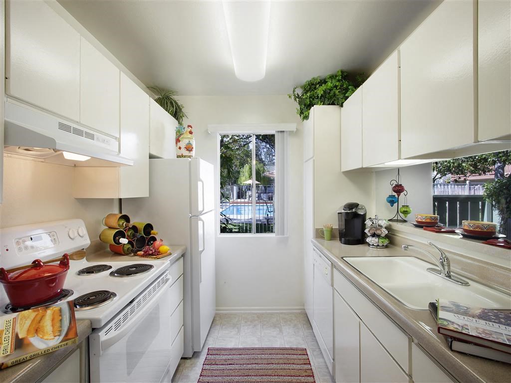 Two BR Apartments in Goleta CA - Pacific Oaks - Modern Kitchen with White Cabinets