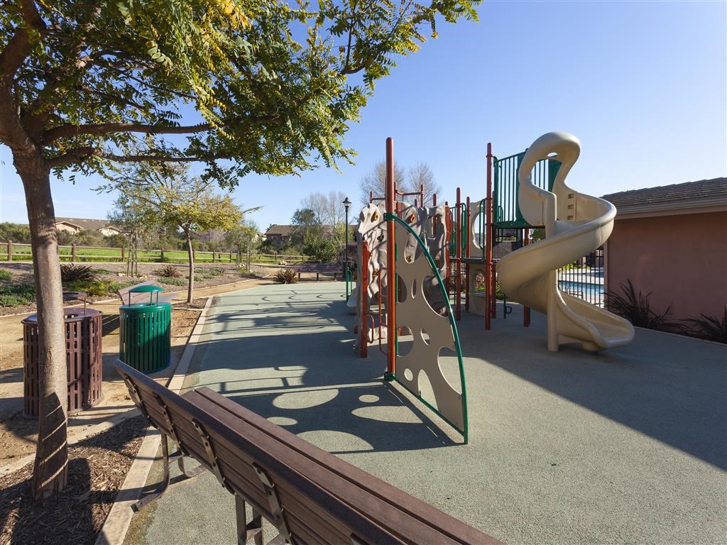 Goleta Apartments- Willow Springs- Playground with Play Area, Padded Flooring, and Park Benches