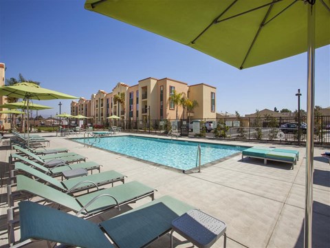 Swimming Pool And Relaxing Area at Hancock Terrace Apartments, Santa Maria, CA