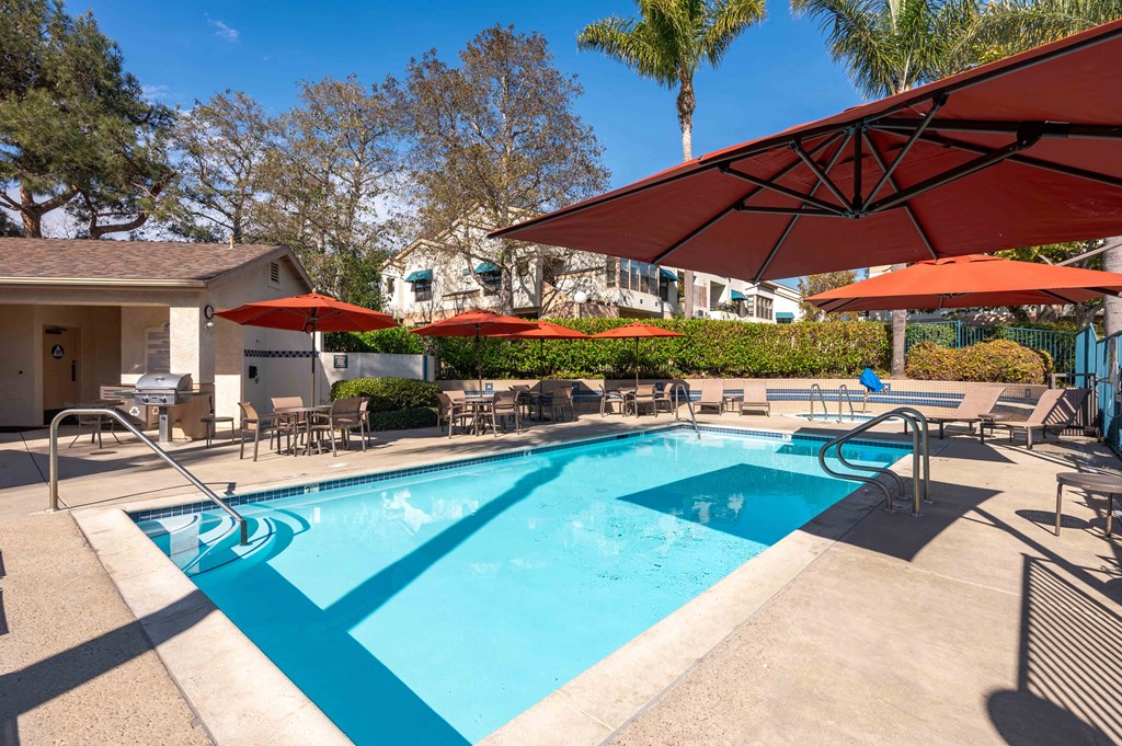 Ventura, CA Apartments Near Walmart - Cypress Meadows - Pool with Jacuzzi and Sun Lounge Chairs