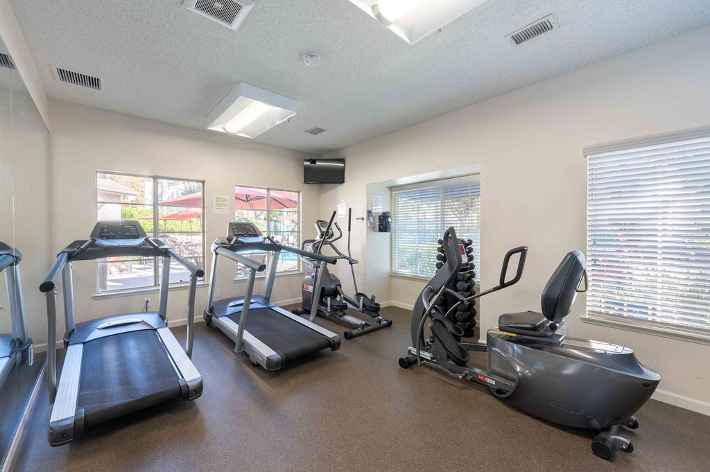 Apartments in Ventura, CA for Rent - Cypress Meadows - Fitness Center with Treadmills, an Elliptical Machine, and Weights