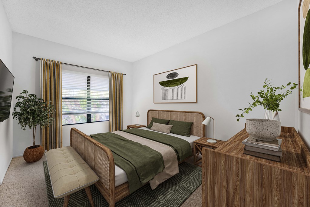 A bedroom with a bed, nightstand, and a chair.