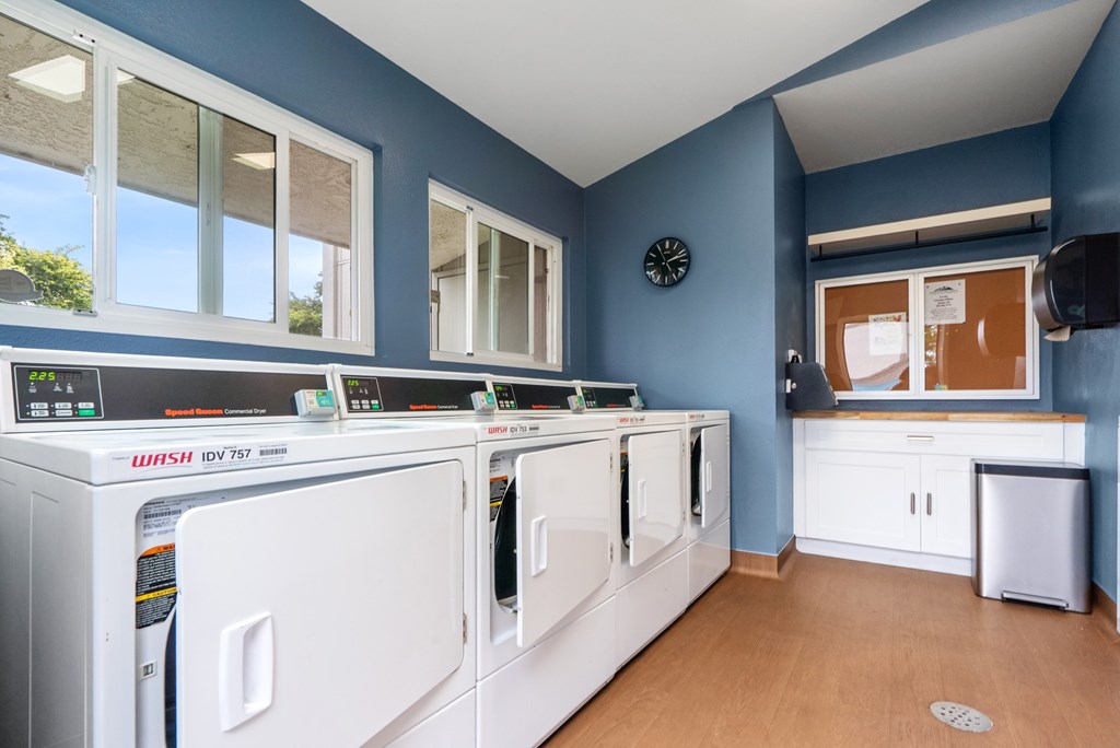 A laundry room with a washer and dryer.