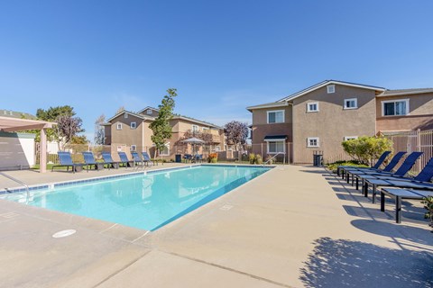 our apartments have a resort style pool with lounge chairs