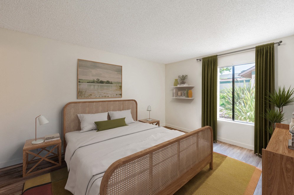 Apartments Near Target - Knollwood Meadows - Spacious Bedroom With Plank Flooring, Area Rug, Bed, Nightstands with Lamps, Dresser, Wall Art, Shelf with Decors, House Plant, and Window with Curtains