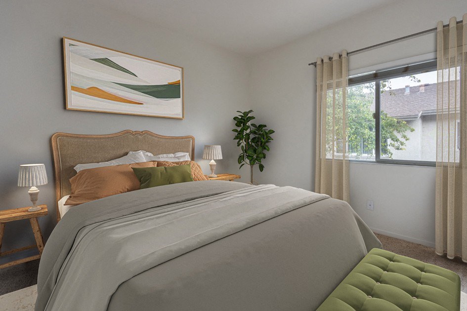 a bedroom with a bed and a window