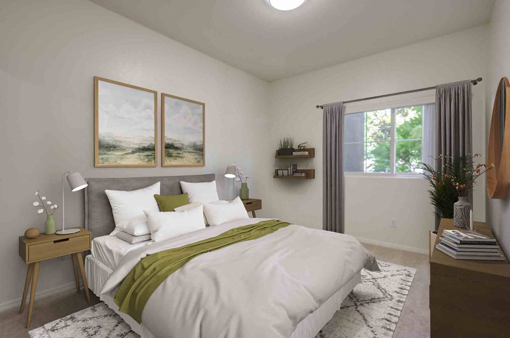 a bedroom with a large bed and a window