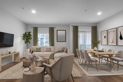 an open living room and dining room with a couch and a table