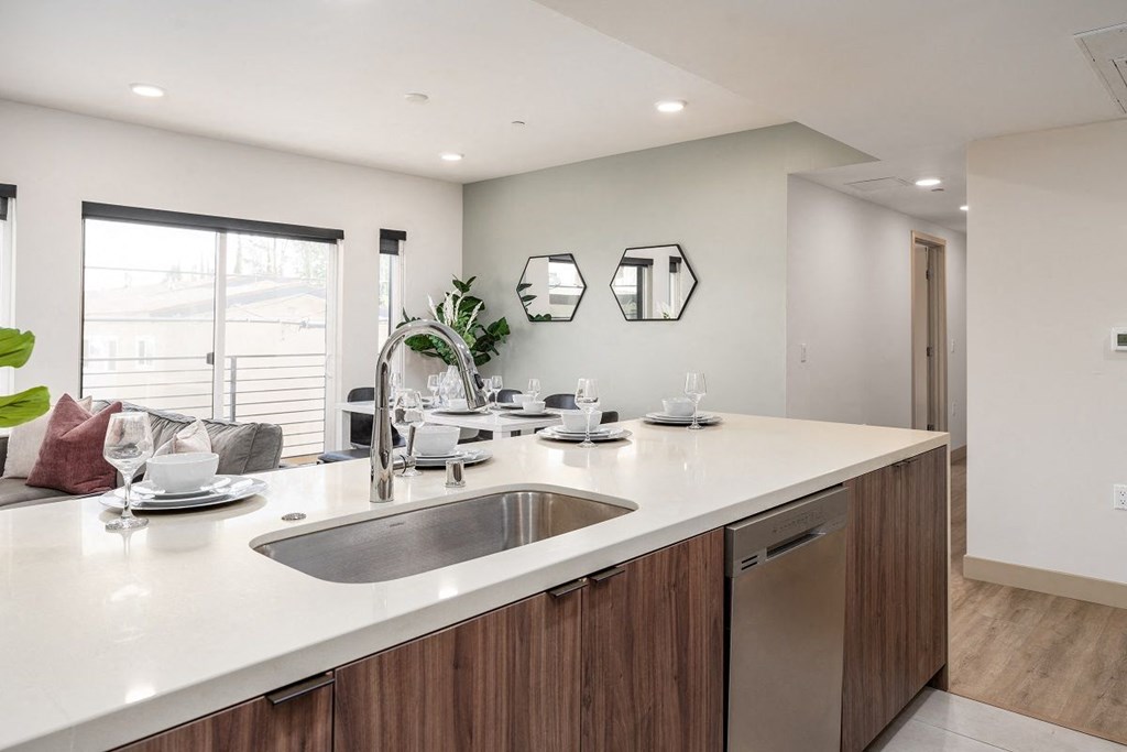 a kitchen with a sink and a counter top at Lido Apartments - 1532 Brockton Ave, Los Angeles, CA, 90025