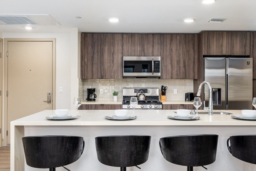 a kitchen with a counter top and a sink at Lido Apartments - 1532 Brockton Ave, Los Angeles, California