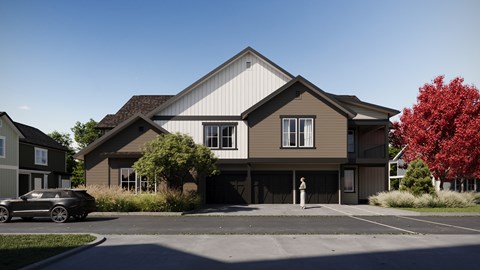 A grey car is parked in front of a two-story house. at The Woods at Copper Ranch, Idaho, 83333