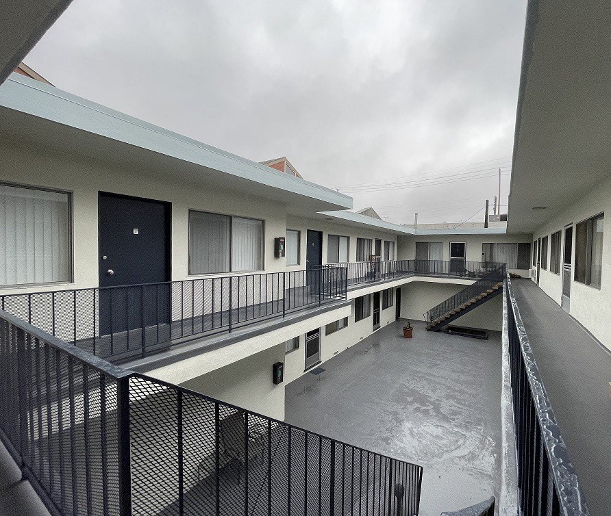 a view of the courtyard of a unit at the cape fear apartments in wilmington, n